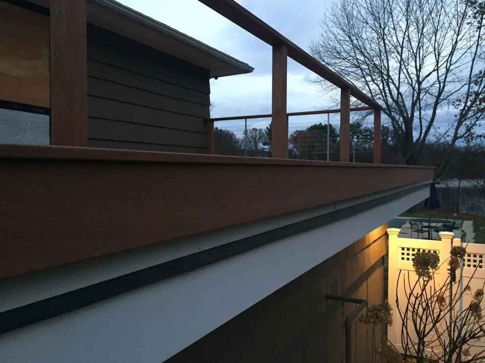 Tailored Mahogany Deck Featuring CableRail System by Loyalty Exterior Solutions - Photo 36