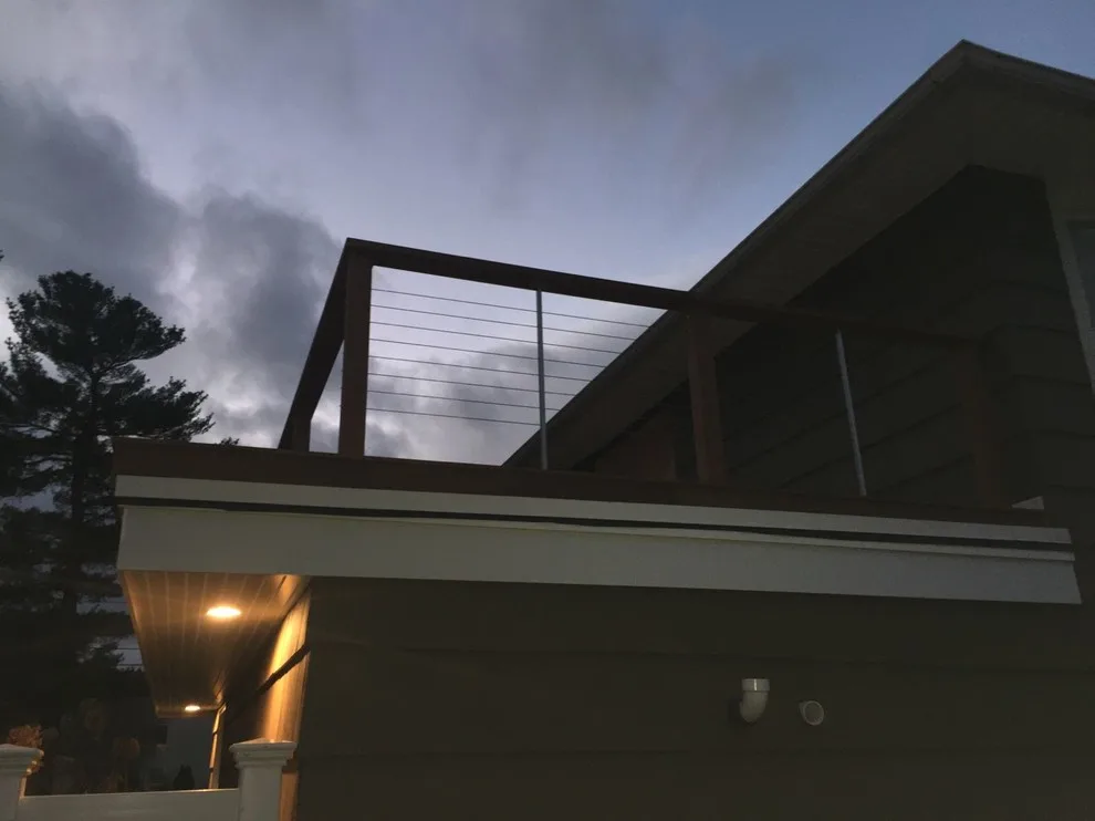 Tailored Mahogany Deck Featuring CableRail System by Loyalty Exterior Solutions - Photo 21