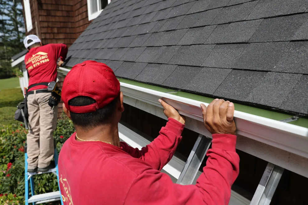Tailored Continuous Heavy-Duty Aluminum Gutters by Valentine Roofing - Photo 9