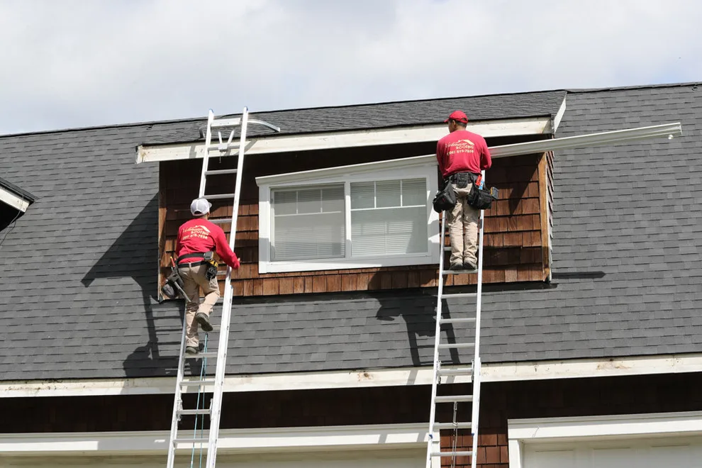 Tailored Continuous Heavy-Duty Aluminum Gutters by Valentine Roofing - Photo 7