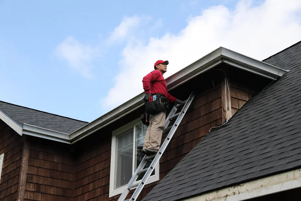 Tailored Continuous Heavy-Duty Aluminum Gutters by Valentine Roofing - Photo 2