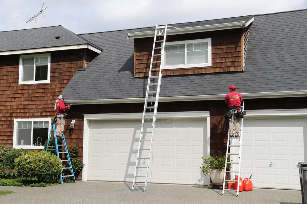 Tailored Continuous Heavy-Duty Aluminum Gutters by Valentine Roofing - Photo 4