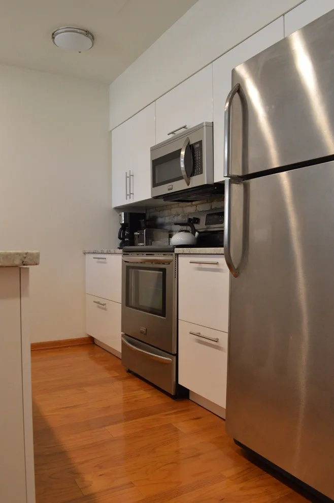 Urban Condo Culinary Space by A-Team Construction Unlimited Inc. - Photo 6