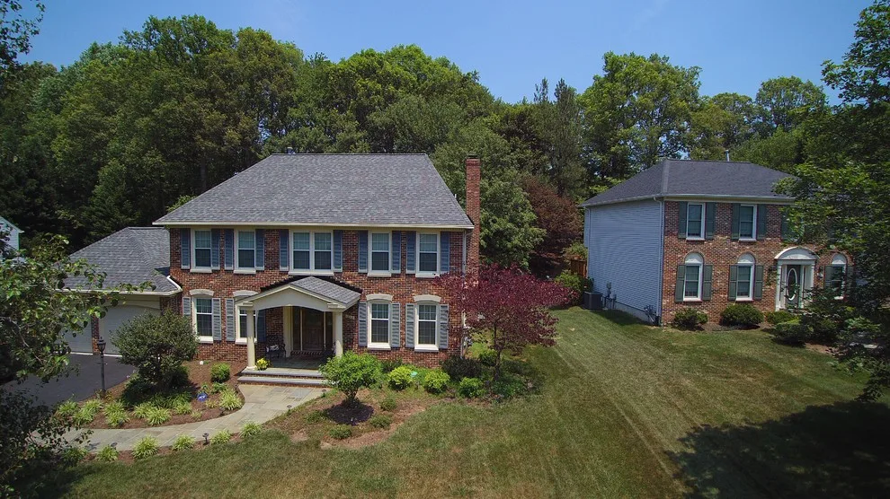Colonial Facade Renovations by DryHome Roofing & Siding, Inc. - Photo 3
