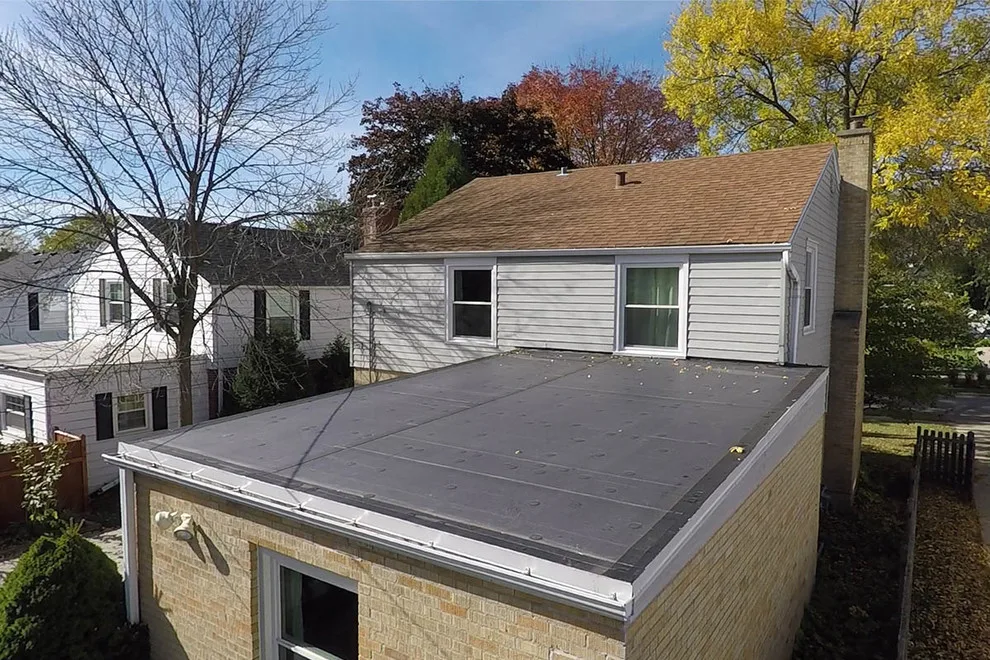 Level Rubber Roof by BCI Exteriors Inc - Photo 2