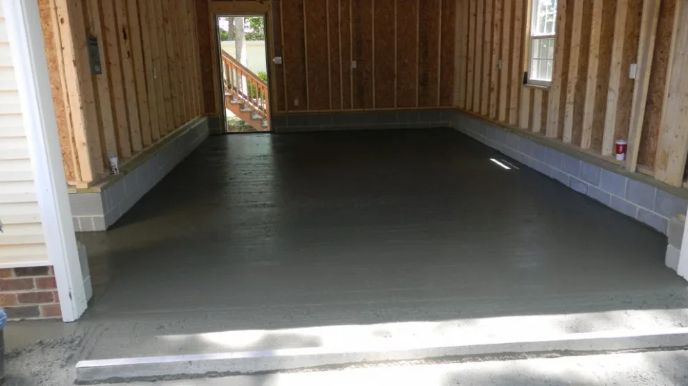 Garage Flooring and Blacktop Driveway by NHL Roofing & Construction - Photo 3