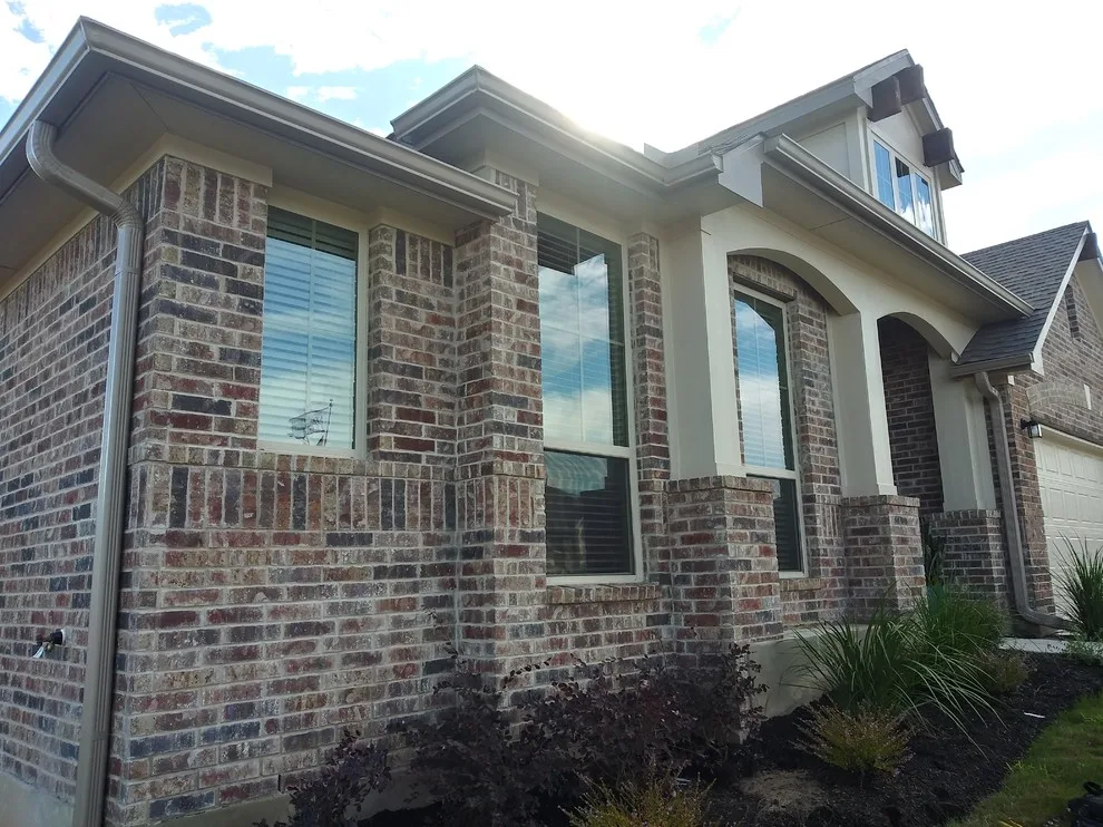 Gutter Setup on Brick House in Hutto, TX by Gutter Tex - Photo 3