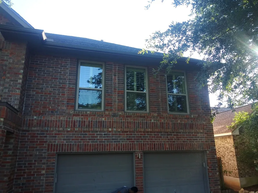 Red Brick House Gutter Installation in Kingsland, TX 78639 by Gutter Tex - Photo 2
