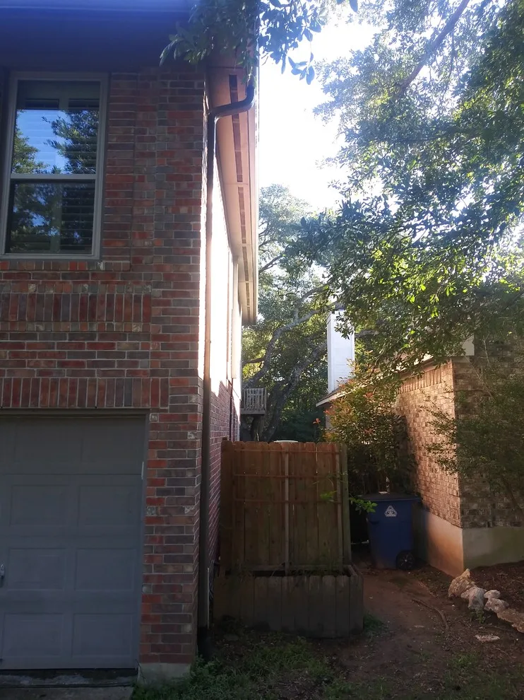 Red Brick House Gutter Installation in Kingsland, TX 78639 by Gutter Tex - Photo 4