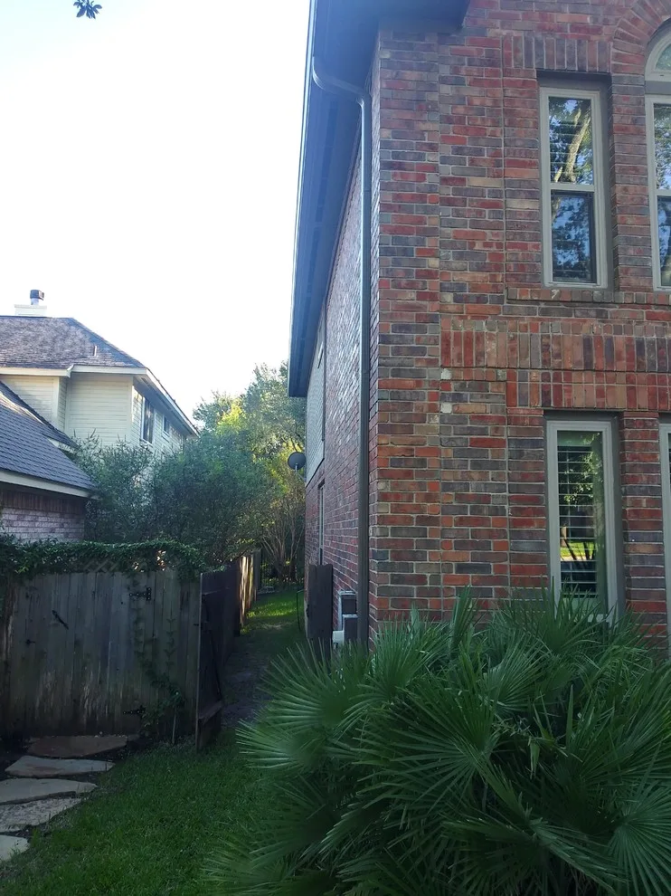 Red Brick House Gutter Installation in Kingsland, TX 78639 by Gutter Tex - Photo 3