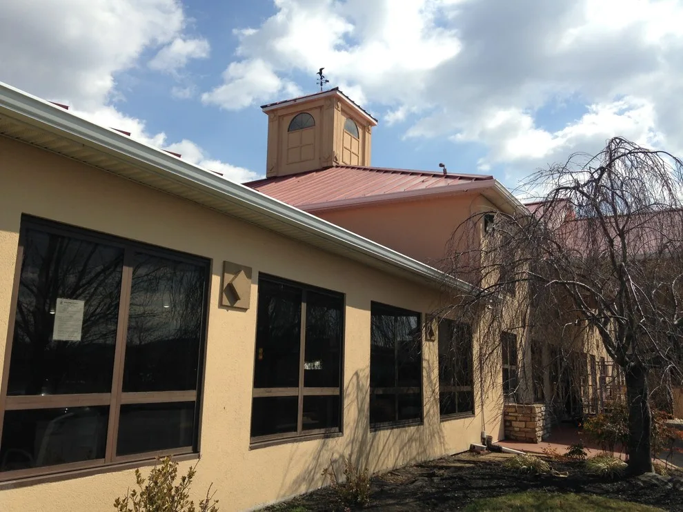 Express & Suites by Holiday Inn by Right Choice Seamless Gutters - Photo 7