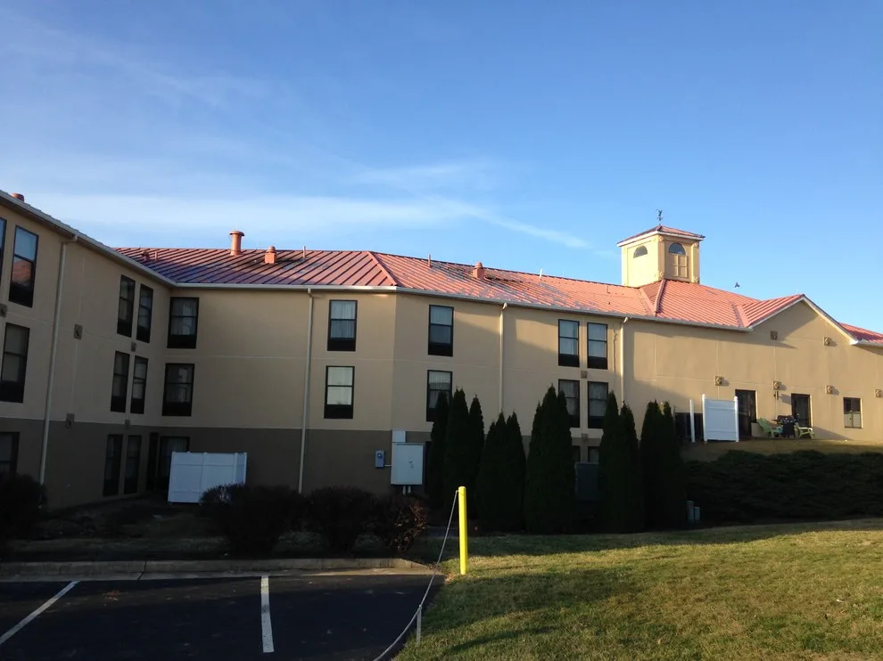 Express & Suites by Holiday Inn by Right Choice Seamless Gutters - Photo 2