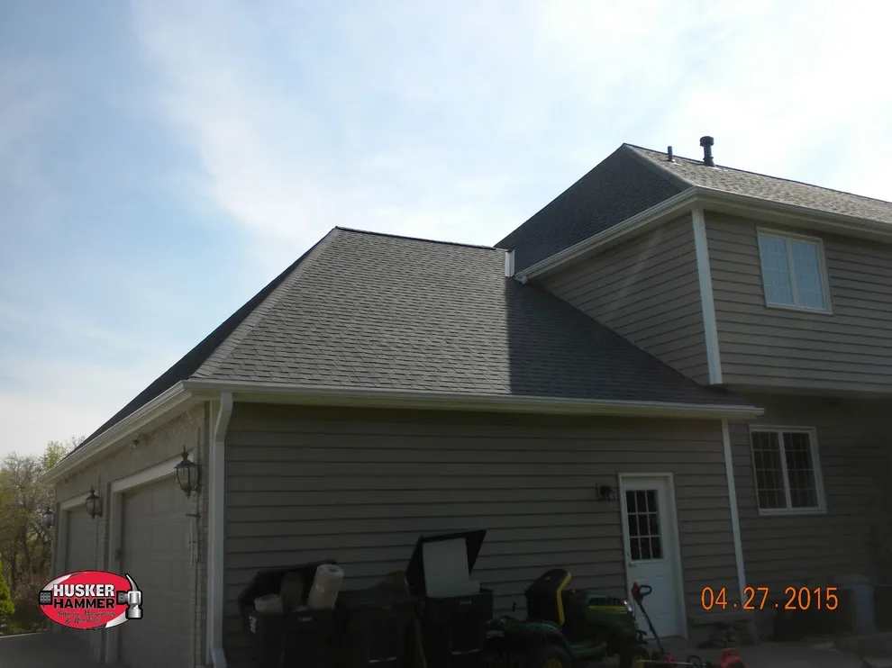 Husker Hammer Siding Windows And Roofing - Photo 12