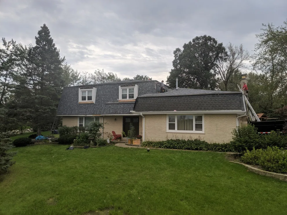 Mansard Roof Renovation by AJ Exteriors & Roofing Inc. - Photo 7