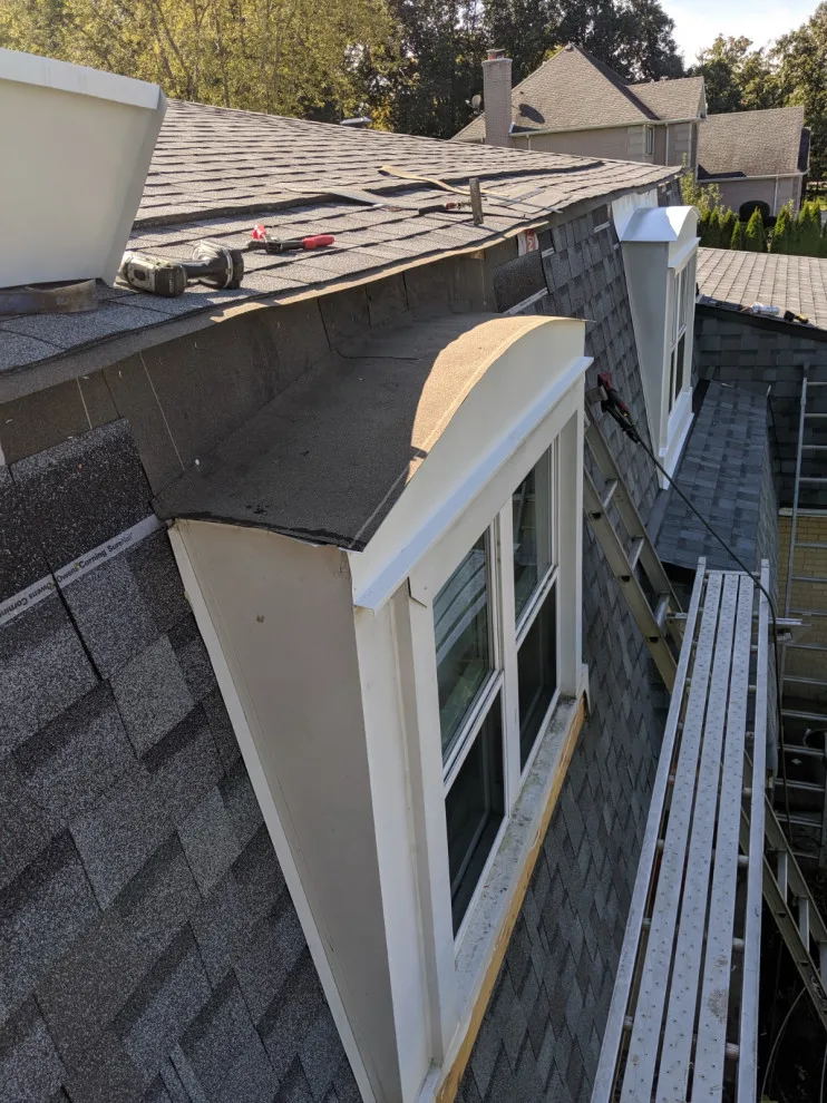 Mansard Roof Renovation by AJ Exteriors & Roofing Inc. - Photo 5