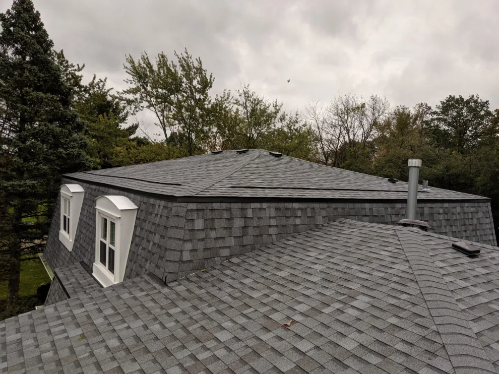 Mansard Roof Renovation by AJ Exteriors & Roofing Inc. - Photo 2