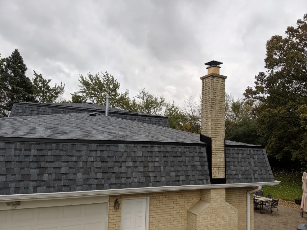 Mansard Roof Renovation by AJ Exteriors & Roofing Inc. - Photo 12