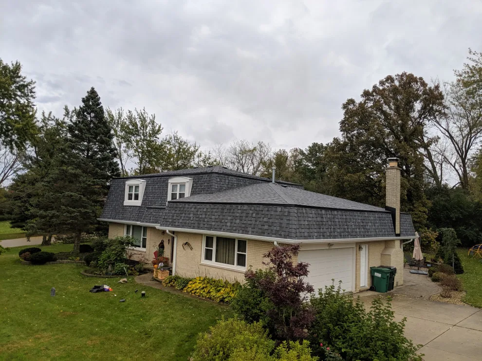 Mansard Roof Renovation by AJ Exteriors & Roofing Inc. - Photo 15