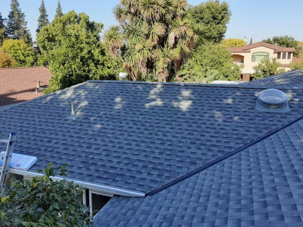Skylight Installation with New Roof by Moctezuma Roofing Inc. - Photo 2