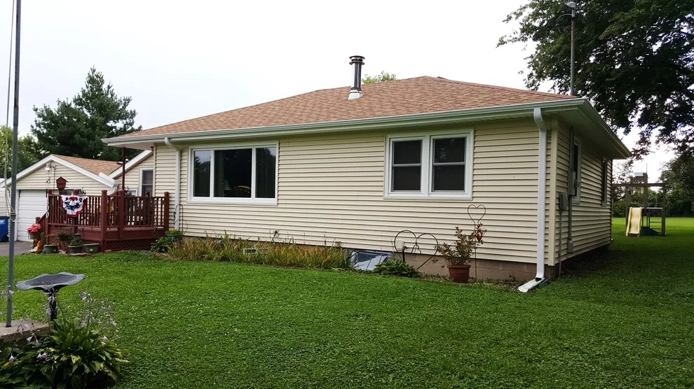 Updated siding and windows by Midwest Construction & Supply INC - Photo 3