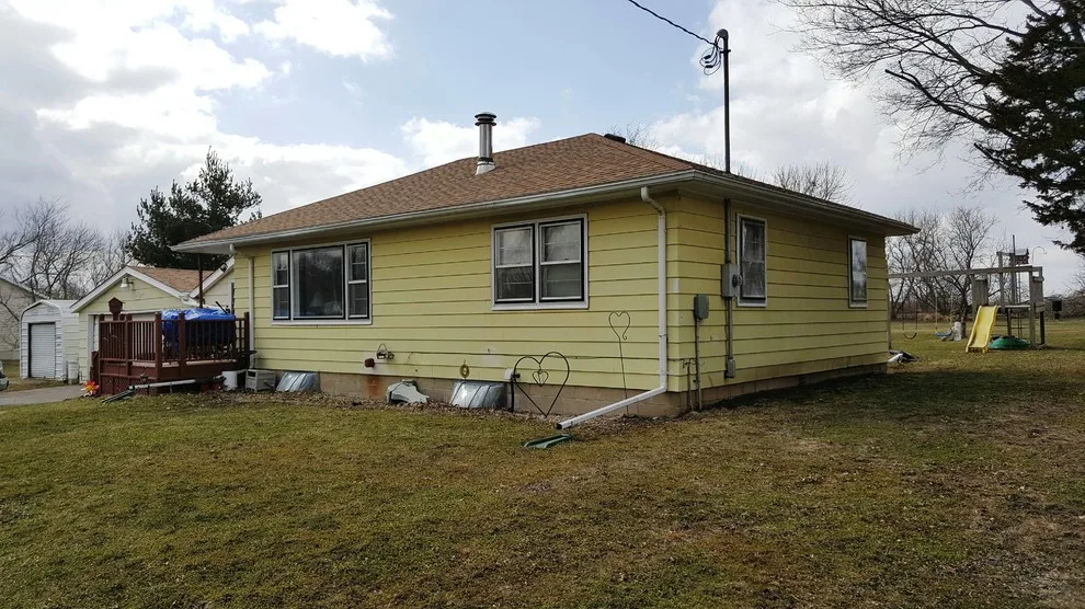 Updated siding and windows by Midwest Construction & Supply INC - Photo 4