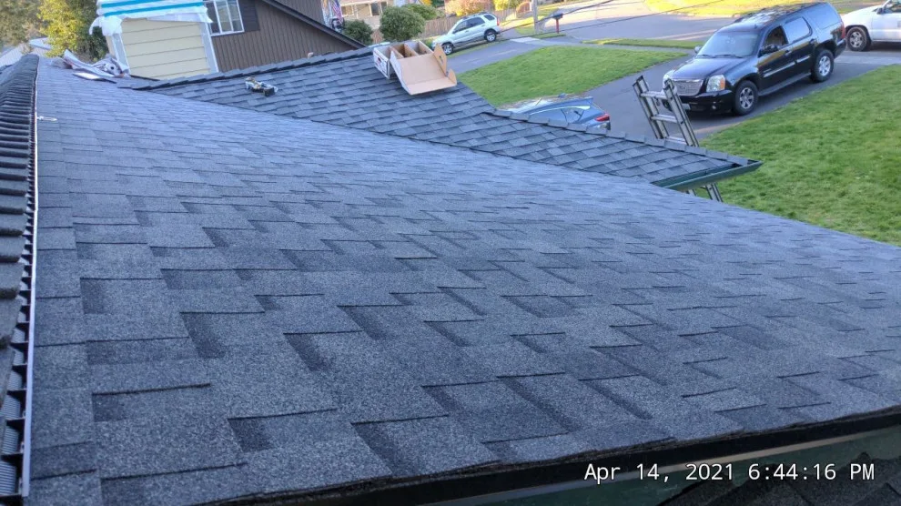 Renton Asphalt Roofing with Chimney Chase and Skylight by RoofSmart - Photo 9