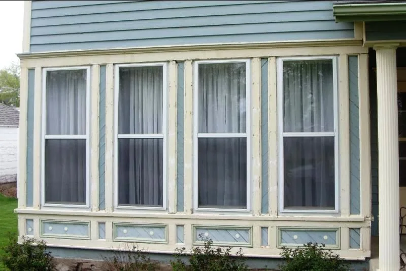 Century-old home window replacement by Midwest Construction & Supply INC - Photo 2