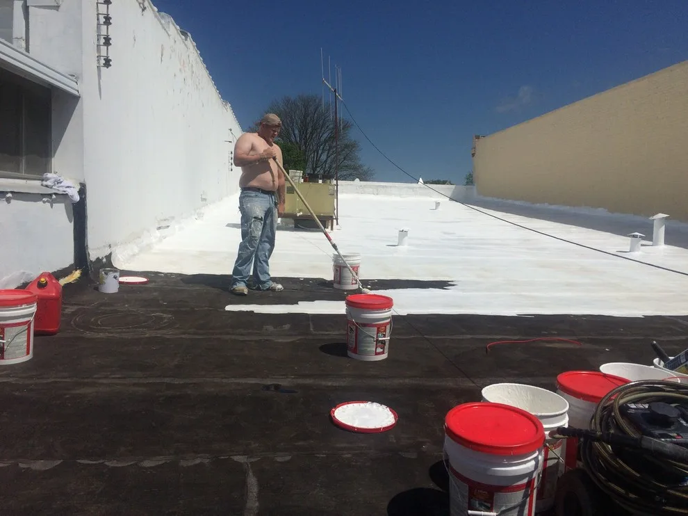 Elastomeric Roof Coating with Rubber Components by Integrity Home Services - Photo 3
