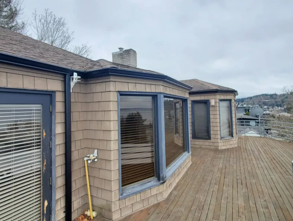 Complex Corner Gutter Project by Eastside Roofing Inc - Photo 2