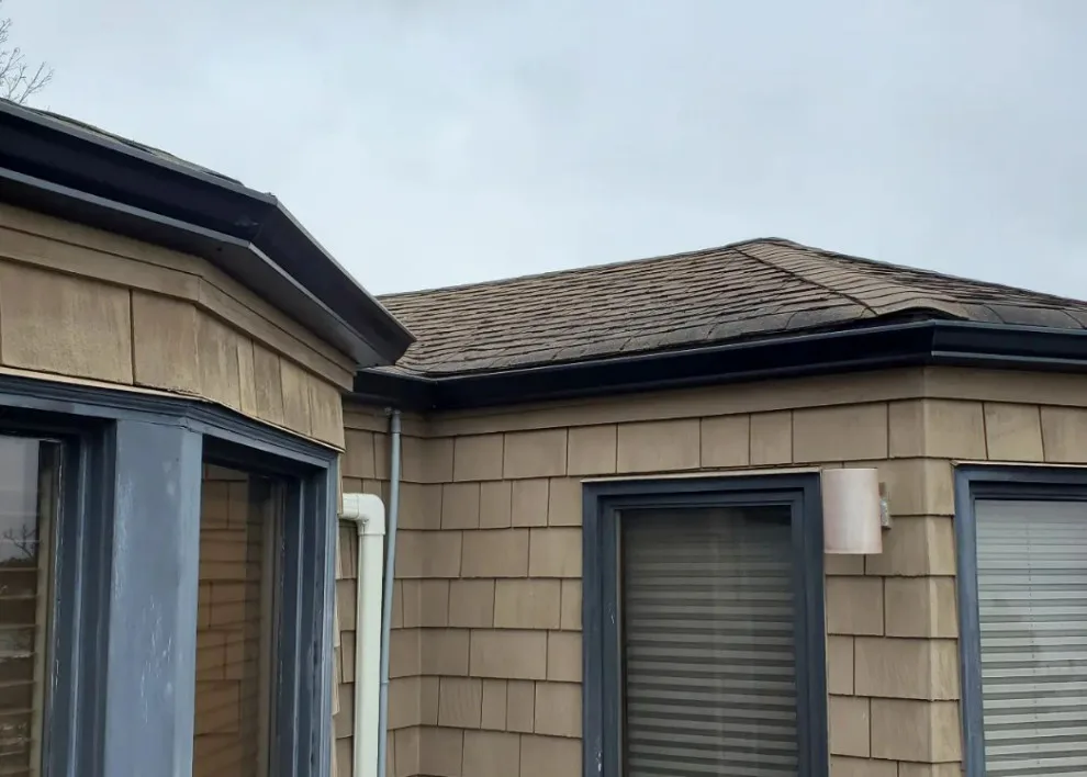 Complex Corner Gutter Project by Eastside Roofing Inc - Photo 3