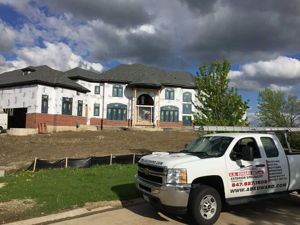 Barrington IL Slate Designer Series Shingle Roofing Project by A.B. Edward Enterprises, Inc. - Photo 9
