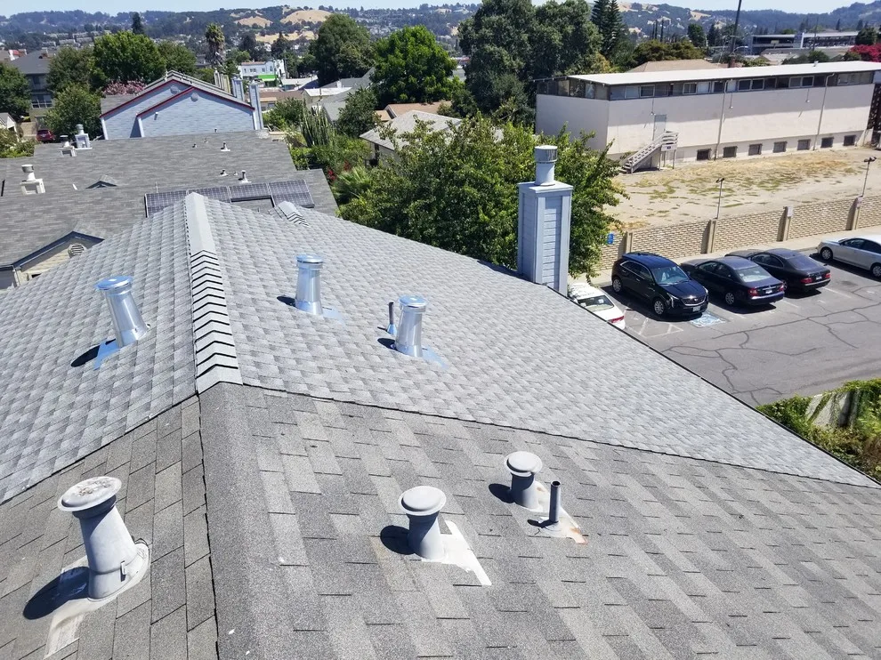 Townhouse Roof Replacement by Moctezuma Roofing Inc. - Photo 3