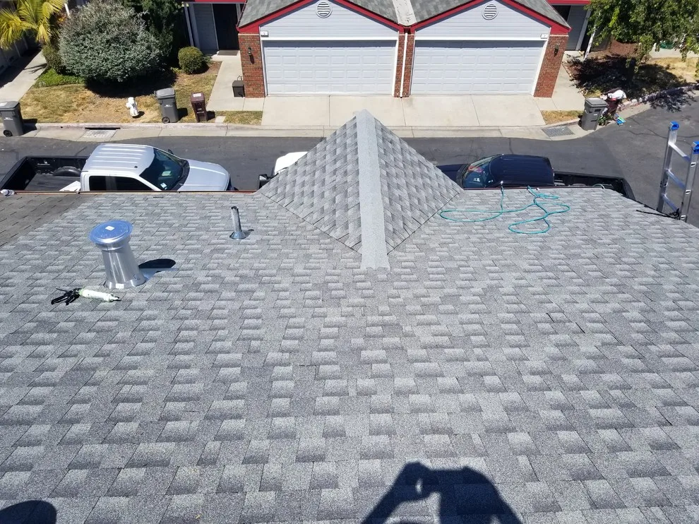 Townhouse Roof Replacement by Moctezuma Roofing Inc. - Photo 2