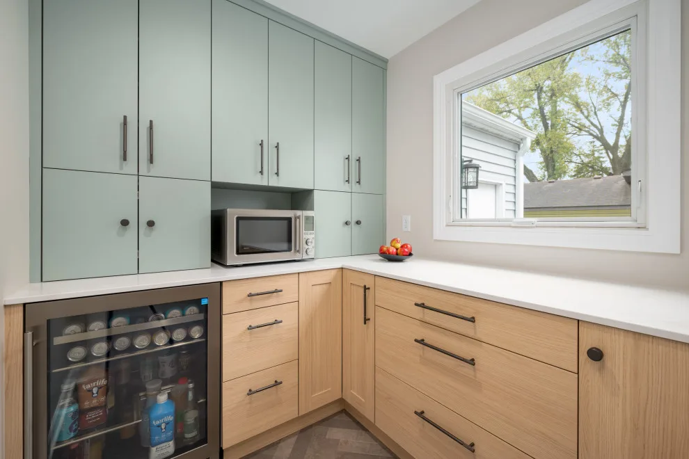 Stylish Sage and Gray Kitchen by Wise Design & Remodel LLC - Photo 10