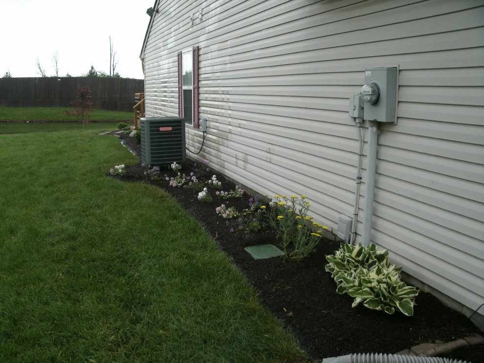 Custom Landscaping design by LovelyLawns & Landscaping - Photo 4