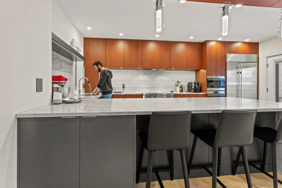 Contemporary Complete Home Renovation by New England Design & Construction - Photo 24