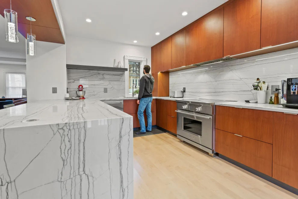 Contemporary Complete Home Renovation by New England Design & Construction - Photo 39