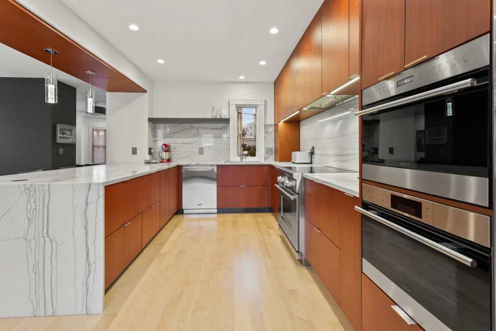 Contemporary Complete Home Renovation by New England Design & Construction - Photo 32