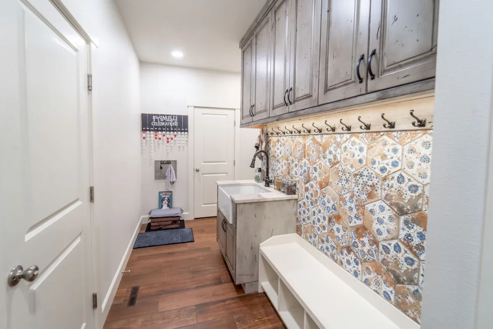 2022 Rustic Kitchen, Utility Room, and Restroom by Renaissance Remodeling - Photo 17