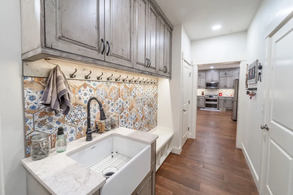 2022 Rustic Kitchen, Utility Room, and Restroom by Renaissance Remodeling - Photo 22