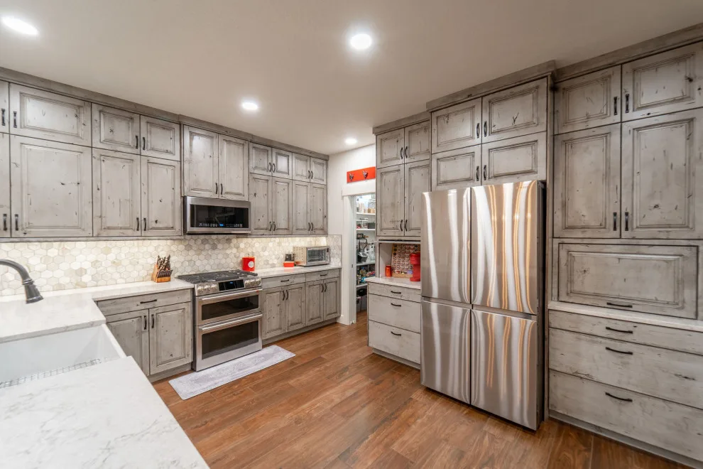 2022 Rustic Kitchen, Utility Room, and Restroom by Renaissance Remodeling - Photo 18