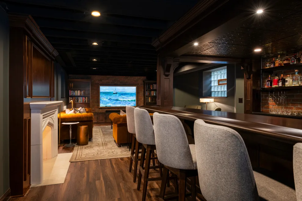 Akron Basement Renovation Featuring a Comfortable Media Space and Custom Bar by Hurst Design Build Remodel - Photo 11