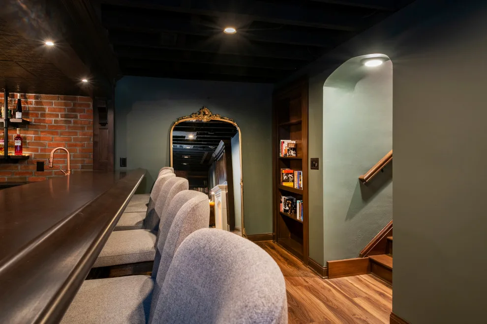 Akron Basement Renovation Featuring a Comfortable Media Space and Custom Bar by Hurst Design Build Remodel - Photo 2