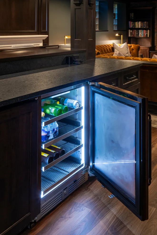 Akron Basement Renovation Featuring a Comfortable Media Space and Custom Bar by Hurst Design Build Remodel - Photo 5