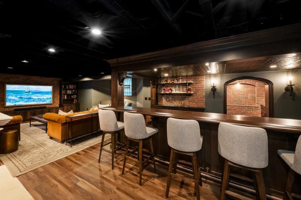 Akron Basement Renovation Featuring a Comfortable Media Space and Custom Bar by Hurst Design Build Remodel - Photo 4