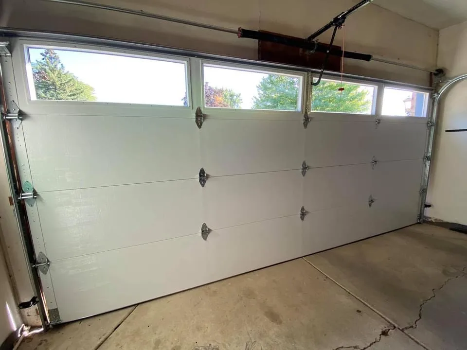 Home Long Panel Installation by ARK Garage Doors LLC - Photo 2