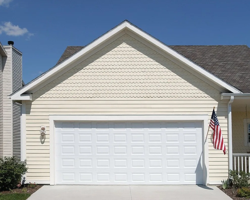 Traditional Raised Panel by TGS Garages & Doors - Photo 11