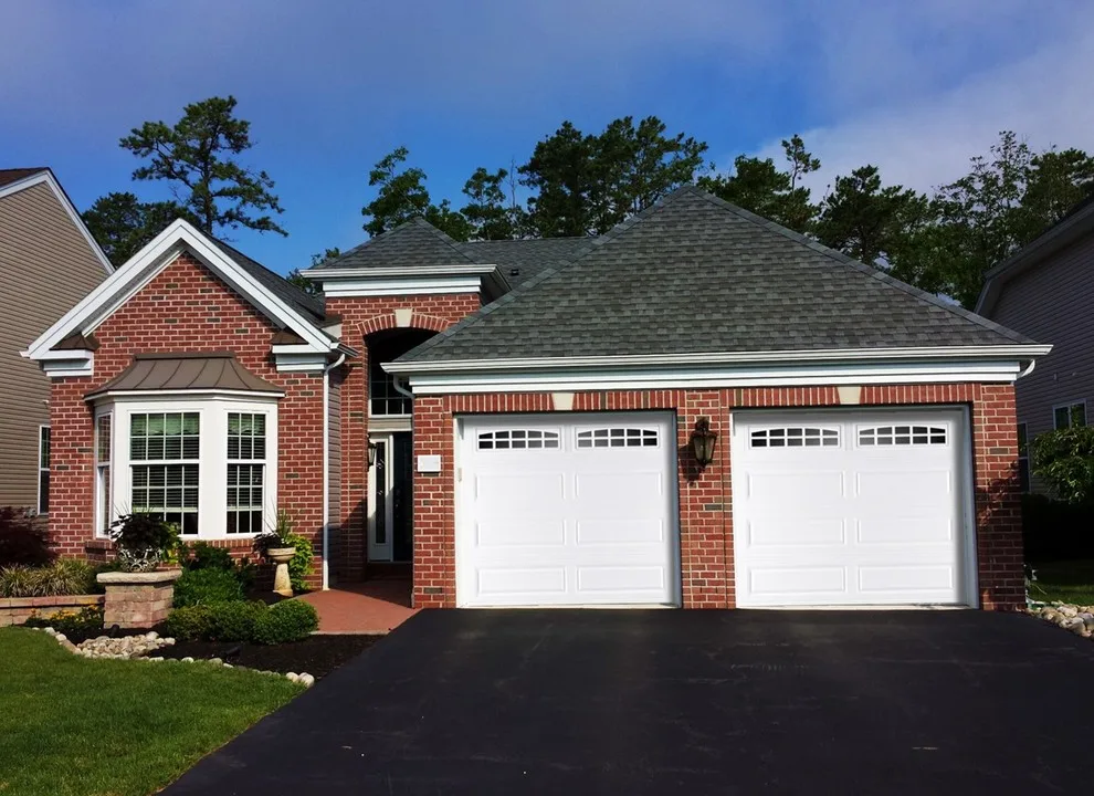 Traditional Raised Panel by TGS Garages & Doors - Photo 7
