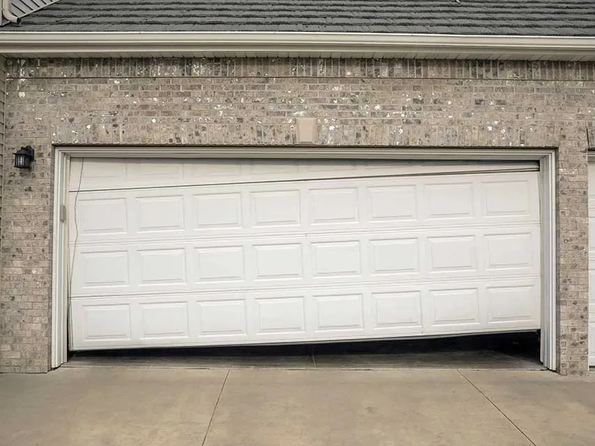 Garage Door Misalignment and Spring Repair Services by Cali Garage Door Repair Inc. - Photo 9