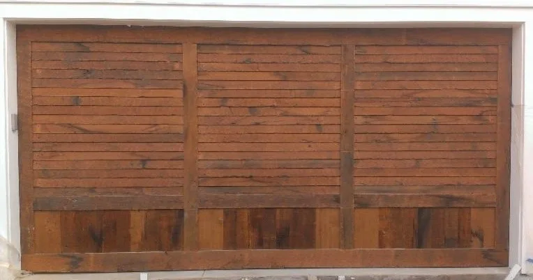 Personalized Wooden Garage Doors by Gates Doors & Ironworks - Photo 16